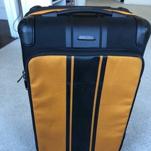 TUMI carry on luggage